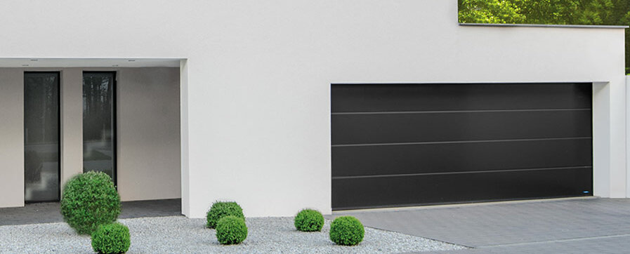 Sectional garage door in satin dark gray