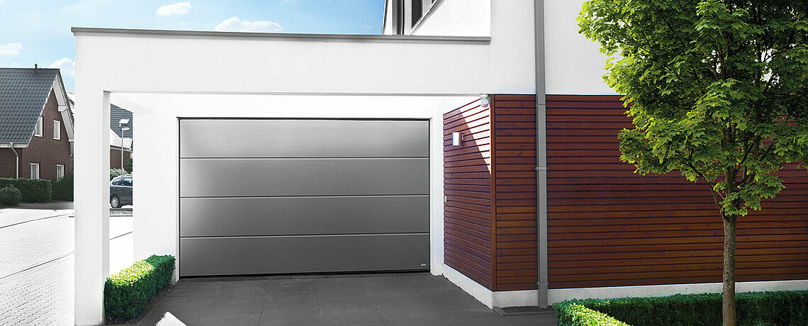 Sectional garage door in gray aluminum